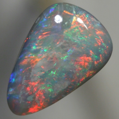 SOLID SEMI BLACK OPAL Sparkles of bright red with green and blue in between